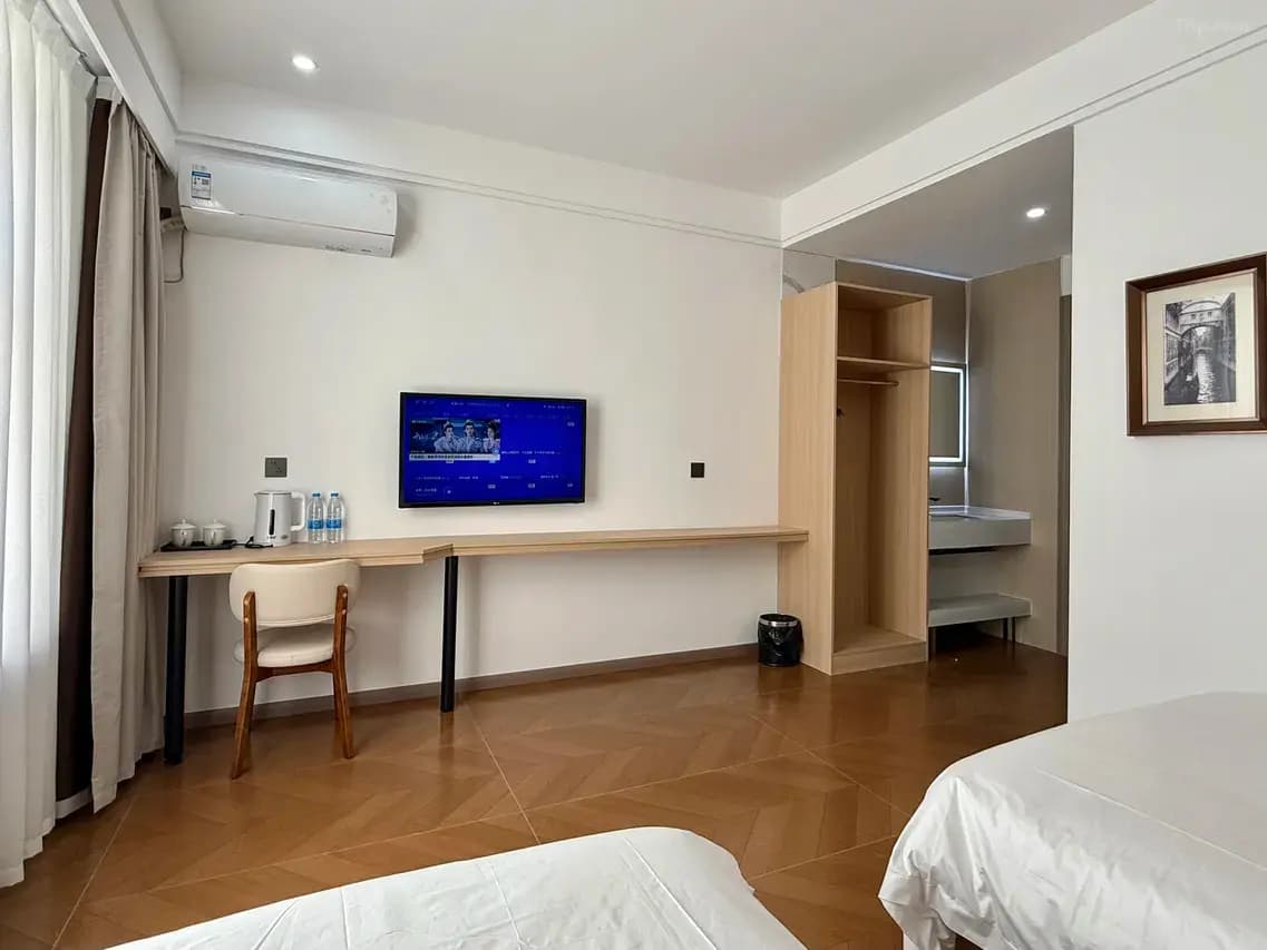 Спальня в отеле Heihe Yuelai Hotel в центре Хэйхэ