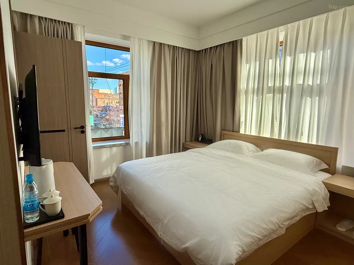 Номер Heihe Yuelai Hotel в Хэйхэ — отель рядом с клиникой «Ино»
